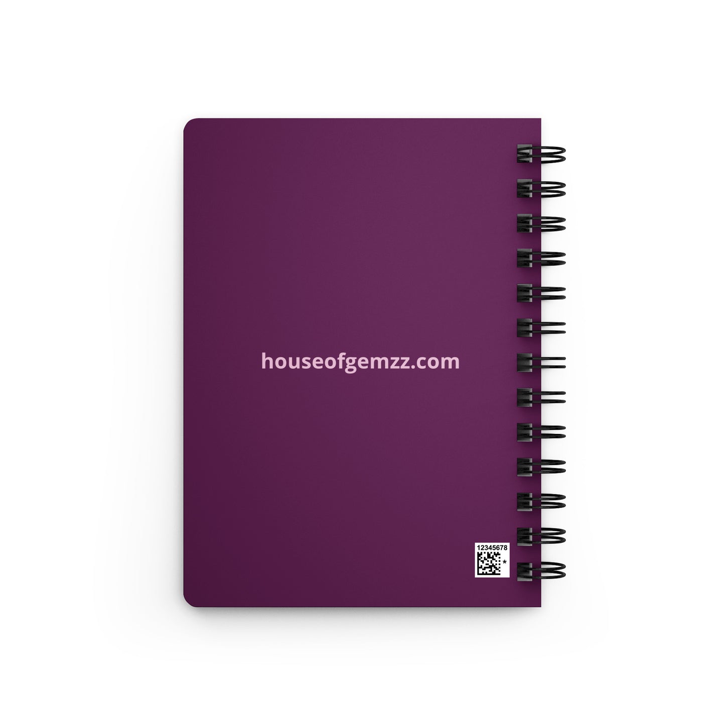 Purple notebook with spiral binding on a white background, featuring 'houseofgemzz.com' branding.