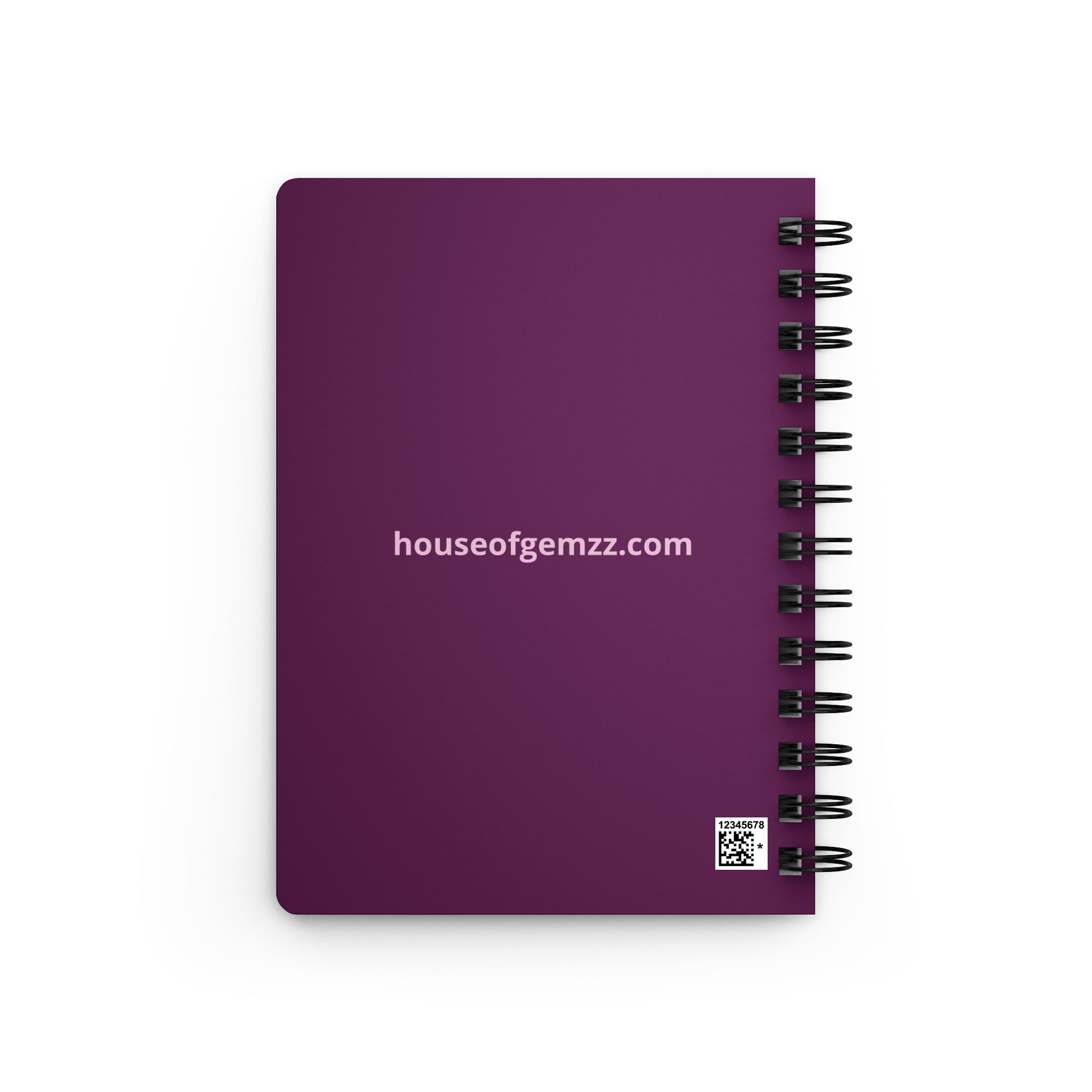 Purple notebook with spiral binding on a white background, featuring 'houseofgemzz.com' branding.